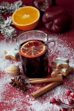 Glass of mulled wine with slice of orange