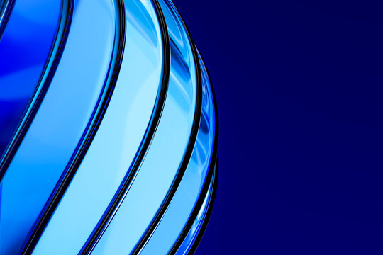 Abstract blue 3D glass wave reflects light beside dark copy space