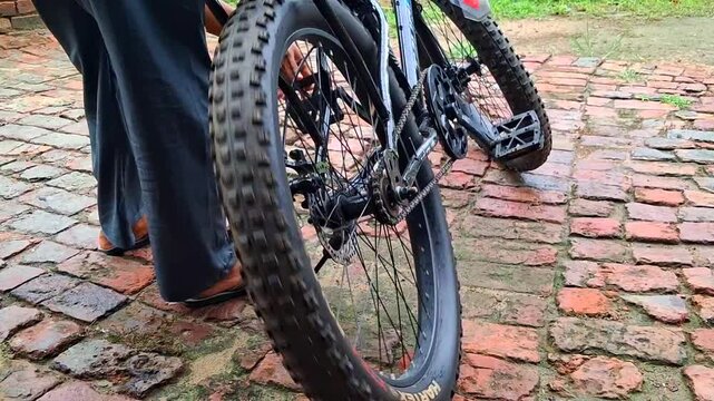 The bicycle wheel spinning rapidly