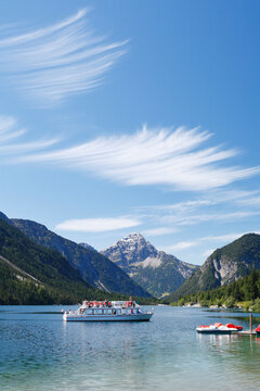 Austria, Tyrol, Tourist in boat on lake plansee near reutte