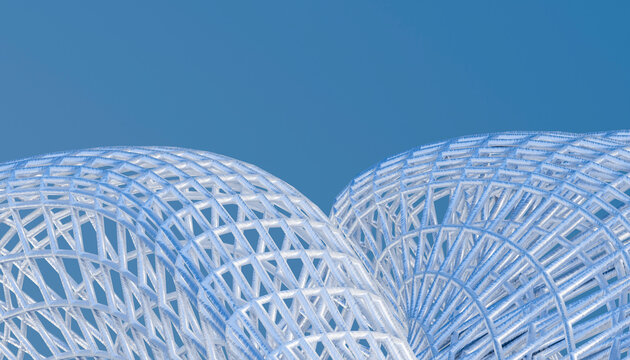 Abstract white lattice structure stands against a clear blue sky