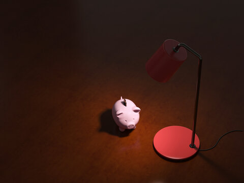 Piggy bank under lamp on table symbolizing financial stability