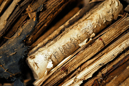 Azerbaijan, Xinaliq, view of obsolete books with arabic writings and script