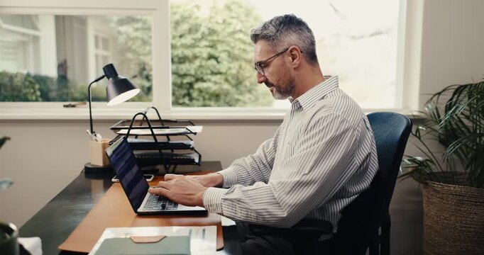 Typing, laptop or business man in home office for finance report, research or investment review. Remote work, wfh and mature person on computer for financial proposal, budget planning or online audit