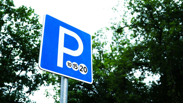 Paid parking road sign marking a regulated parking zone in the city, representing parking fees, traffic rules, urban transportation and municipal street infrastructure