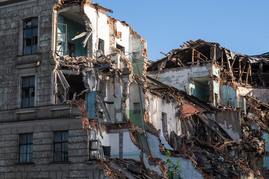 Fragment of an old collapsed house on a sunny day
