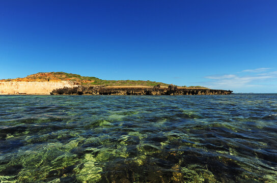 Madagascar, Ramena, Mer d'Emeraude, view of the coast from the emerald and transparent sea