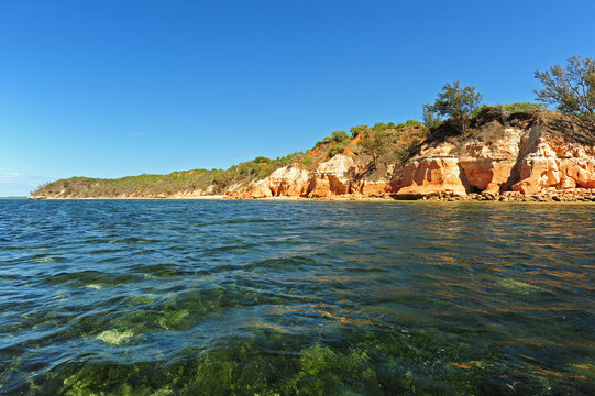Madagascar, Ramena, Mer d'Emeraude, view of the coast from the emerald and transparent sea