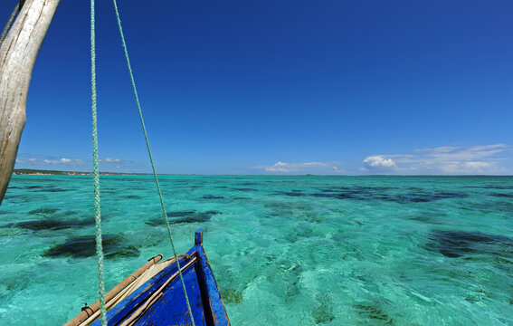 Madagascar, Ramena, Mer d'Emeraude, view of the coast from a fishing boat on the emerald and transparent sea