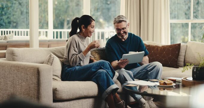 Finance, couple or coffee with tablet in home for income mapping, monthly cash flow or funny chat. Beverage, mature people or laugh with tech for financial summary, tax filing joke or budget planning