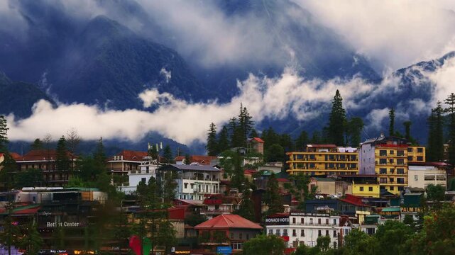 Sapa, popular tourist town nestled in the Ho&agrave;ng Li&ecirc;n Sơn mountains with dramatic mystic cauldron of thermal cloud movement. Close up view.