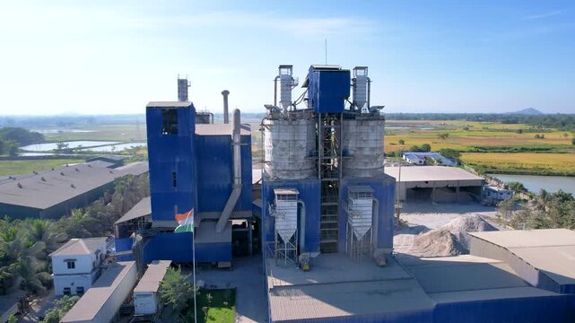 Pulling back from industrial cement plant Junbeel village Assam India