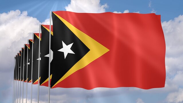 Multiple Timor Leste Flags Waving on Blue Sky Background