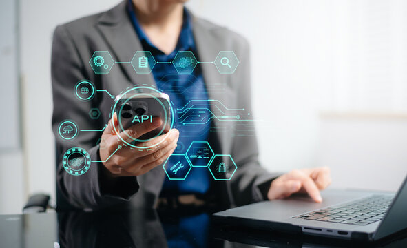 API Application Programming Interface, woman using laptop, tablet and smartphone with virtual screen API icon Software development tool, modern technology