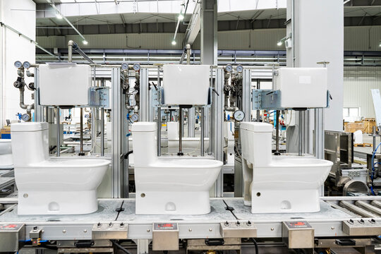 Scene of an automated production workshop for ceramic toilets in a bathroom fixture factory