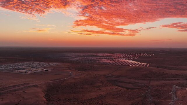 Aerial View of Utility-Scale Solar Farm with Battery Energy Storage System in Arid Desert