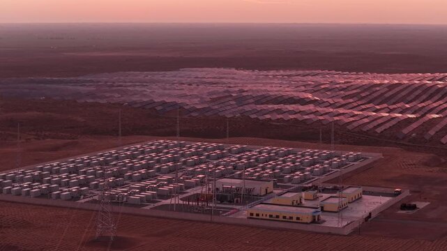 Aerial View of Utility-Scale Solar Farm with Battery Energy Storage System in Arid Desert