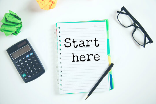 Notebook with first page reading start here written in casual handwriting