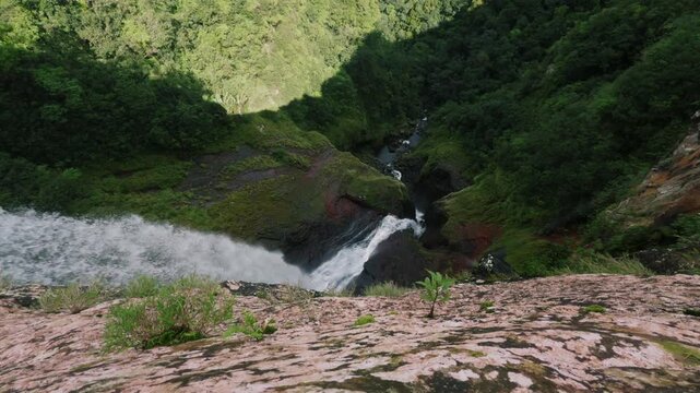 A dizzying view down the Cascade 500 pieds/500 foot waterfall in Mauritius from above