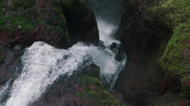 Water rushing downstream from the 500 foot waterfall/Cascade 500 pieds in Mauritius