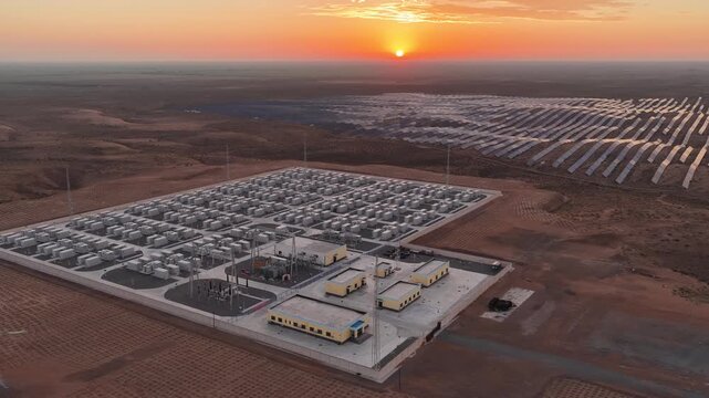 Aerial View of Utility-Scale Solar Farm with Battery Energy Storage System in Arid Desert