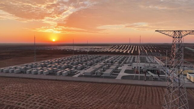 Aerial View of Utility-Scale Solar Farm with Battery Energy Storage System in Arid Desert