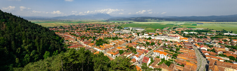 Fototapeta premium Ancient city of Rasnov in Romania. Panorama of the city from the air