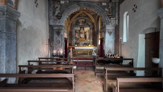 Interior of the small, historic church of Chiesa di San Rocco (St. Roch's Church) from 1536, located near the old port in Limone sul Garda, Italy