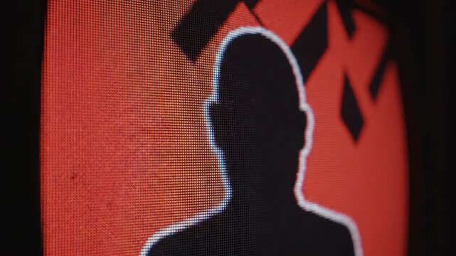 Retro tv screen showing glitch static and human silhouette in red.