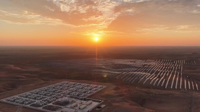 Aerial View of Utility-Scale Solar Farm with Battery Energy Storage System in Arid Desert