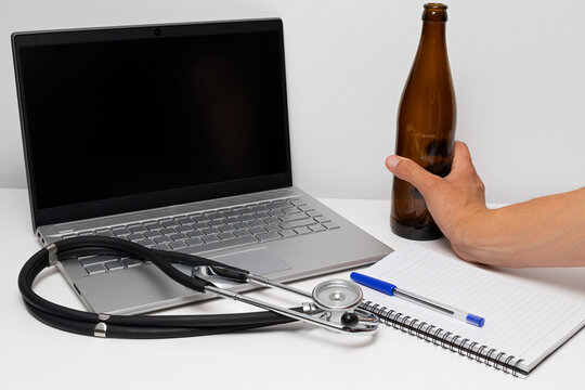Stressed Medical Professional Drinking Alcohol at Work