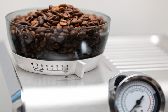 Modern Stainless Steel Espresso Machine with Built-In Coffee Grinder