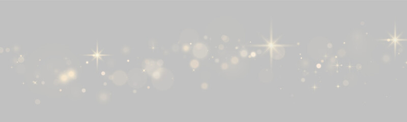 Scattered golden bokeh and luminous star shapes on a black background with soft glow effect on transparent background © svetilo