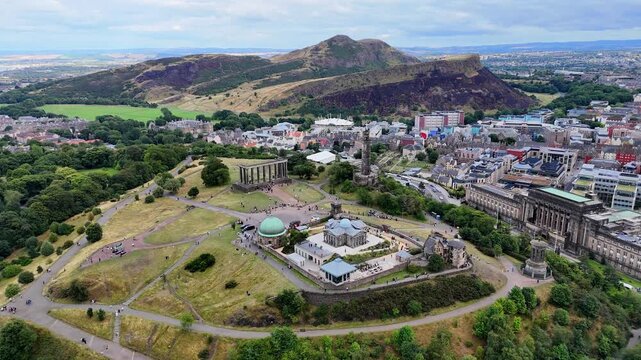 Aerial view of Calton Hill monuments with Arthurs Seat beyond Edinburgh. Scotland.