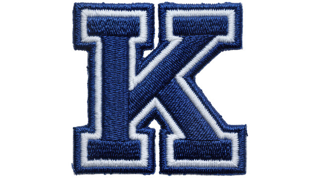 Blue and white embroidered letter K patch, isolated on transparent background