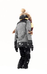 Person walking through falling snow in winter clothing © Anatoliy Novikov