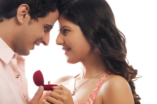 Couple with engagement ring