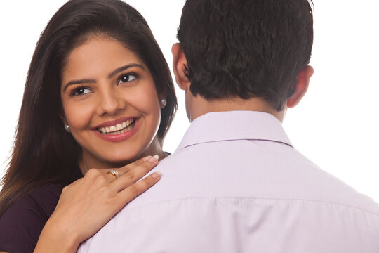 Rear view of a woman smiling