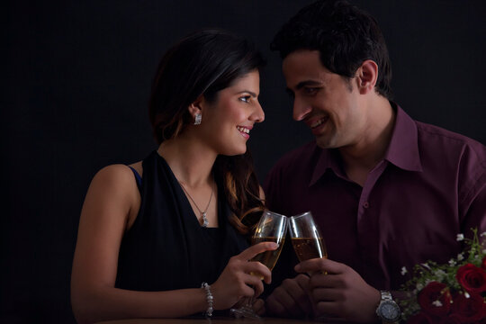 Couple with glasses of wine on Valentines Day