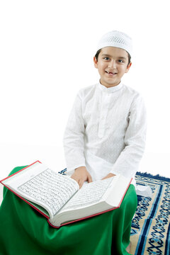 Muslim boy with the Quran 