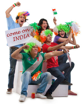 Youngsters with wigs cheering 