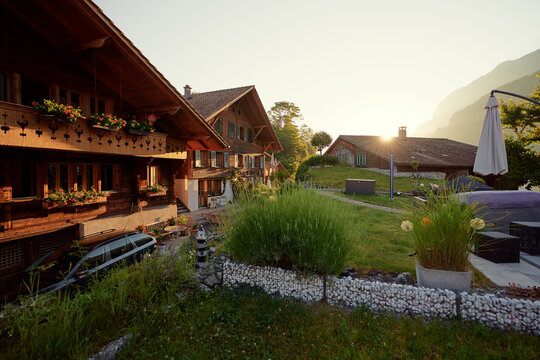 Charming Mountain Village Homes at Sunrise with Lush Gardens and Scenic Views