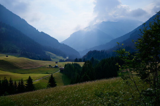 Scenic Mountain Valley Landscape With Rolling Hills and Dense Forests