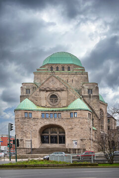 Old Synagogue in Essen, Germany, front view. Historic art nouveau and Byzantine style architecture under cloudy winter sky without snow