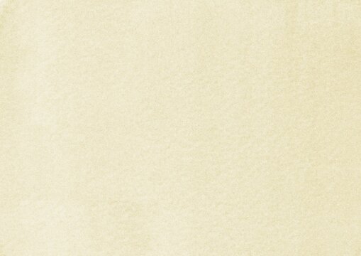 Close-up view of soft cream felt fabric material showing fibrous texture for textile and craft design applications.