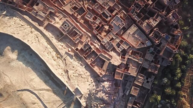 Aerial view of the historic earthen clay architecture of the ancient fortified village of Ait Benhaddou, Draa-Tafilalet, Morocco.
