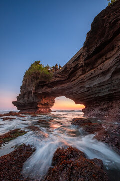 sunset over the Batu Bolong Temple, Tanah Lot, Bali