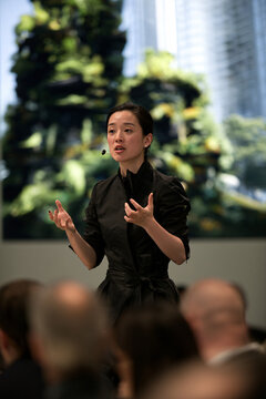 Diverse Female Architect Presenting Green City Plan Authentic Architecture Corporate Realism Sustainability Design