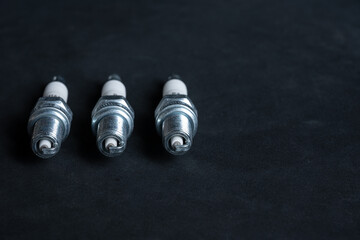 Three New Spark Plugs for Outboard Engine Maintenance