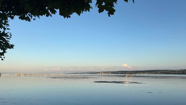 Where water meets the horizon: A breathtaking panoramic view over the tranquil, sapphire expanse of Lake Constance.